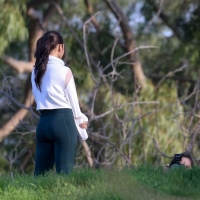Vanessa Hudgens filming a sportswear ad in LA in tight green leggings 32.jpg
