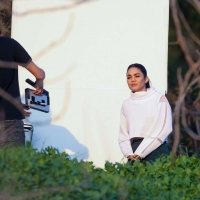 Vanessa Hudgens filming a sportswear ad in LA in tight green leggings 35.jpg