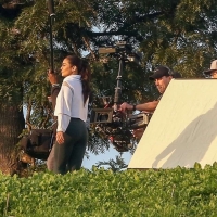 Vanessa Hudgens filming a sportswear ad in LA in tight green leggings 29.jpg