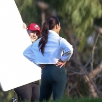 Vanessa Hudgens filming a sportswear ad in LA in tight green leggings 42.jpg