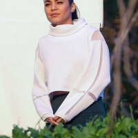 Vanessa Hudgens filming a sportswear ad in LA in tight green leggings 41.jpg