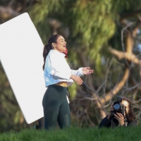Vanessa Hudgens filming a sportswear ad in LA in tight green leggings 60.jpg