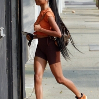 Skai Jackson at a dance studio in brown spandex shorts 05.jpg