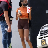 Skai Jackson at a dance studio in brown spandex shorts 10.jpg