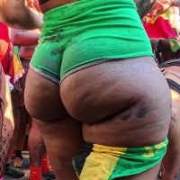 Candid ebony carnival babe with a phat pear shaped booty showing off her ass cheeks in green booty shorts Lyrical Nympho.mp4-2026-04-26-10h22m52s277.jpg