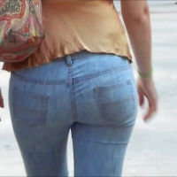 Brown haired babe in jeans