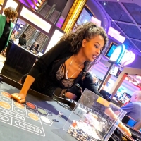Hot candid ebony casino dealer in a sexy top showing some cleavage V.mp4-2024-04-27-08h59m36s528.jpg