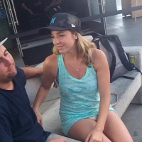 Upskirt of a girl sitting with her boyfriend