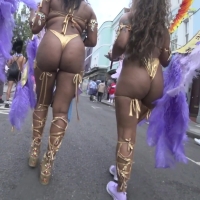 Couple of sexy candid street festival ebony babes with nice asses in gold thong costumes The_Joker - GOTHAM_558.mp4-2025-05-02-15h18m06s654.jpg
