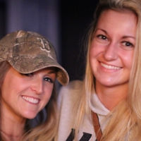 Couple of blonde friends hanging out in jeans and leggings Couple blonde friends hanging out
