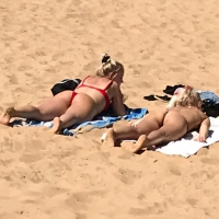 2 sexy Swedish blondes on the beach in little bikinis 2 sexy Swedish blondes