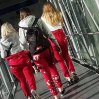 3 girls walking in red jeans and pants 3 girls in red pants