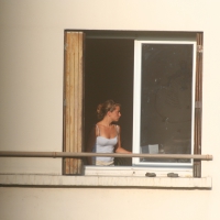 Pictures of neighbors in various outfits and changing Peeping Tom pics of neighbors