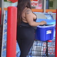 Fat ebony chick showing massive side boob Fat ebony chick side boob