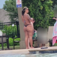 Big booty candid milf at the pool in a thong bikini FDATP34.mp4-2023-05-05-16h01m08s669.jpg