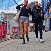 Candid tattooed thick chick in purple bikers with a big booty Cyclingtatt.mp4-2023-05-06-10h55m02s308.jpg