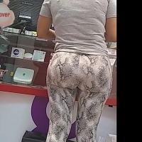 Latina in patterned leggings