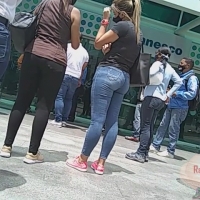 Sexy ass in line in jeans