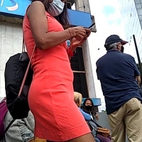 Latina in pink skirt