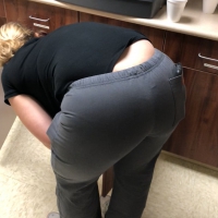 Mature blonde lady with thick ass in scrubs Mature blonde in scrubs