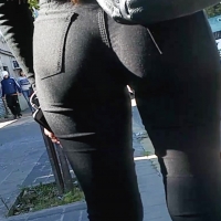 Pretty Latina in black jeans