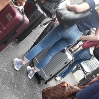 Airport booty in jeans