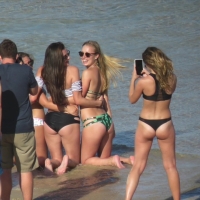 Group of candid beach teens with nice booties in skimpy bikinis gg.mp4-2026-05-16-11h47m35s677.jpg