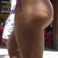 Two big booty babes in thong bikinis Two big booties in thong bikinis