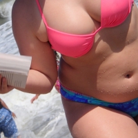 Thick beach babe with big booty and big boobs Thick beach babe