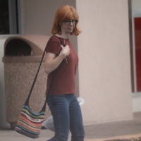 Redhead milf with glasses and in jeans leaving TJ Maxx Redhead milf in jeans