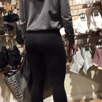 Pigtailed babe with a great ass in leggings