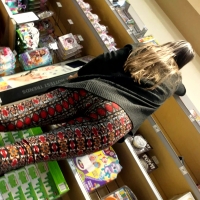 Cute employee in patterned leggings