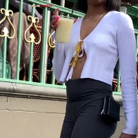 Braless black babe