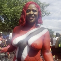 Candid body painted street carnival ebony girl with big tits and a big booty gets creamed and grinded gold45.mov-2026-05-28-14h07m35s758.jpg