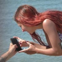 Beautiful and sexy candid redhead at the beach in a patterned bikini with a delicious ass OG Piu Bella.mp4-2023-05-29-10h33m21s725.jpg
