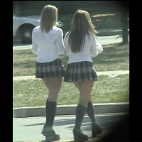 Schoolgirls in school outfits
