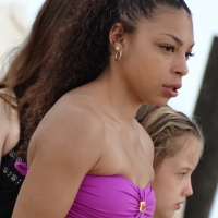 Sexy light skinned black girl in a purple bikini busted Black girl in purple bikini