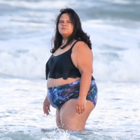 Extra thick girl at the beach in a bikini Extra thick girl