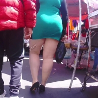 Candid sexy chubby Latina babe in a tight little green skirt chubby in green dress.mp4-2023-06-03-07h43m30s073.jpg