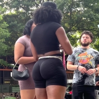 Black girl in spandex shorts