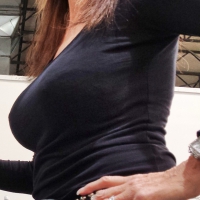 Milf in jeans shopping with big tits Milf in jeans with big tits