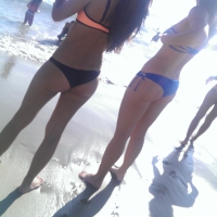 3 hotties in bikinis with nice bodies on Venice Beach taking pictures 3 hot girls on Venice Beach