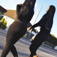 2 sexy black girls in leggings with nice asses 2 sexy black girls in leggings