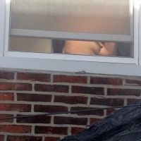 Neighbor spy pics of her on the toilet and showing her tits Neighbor on the toilet