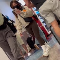 Quick clip of a candid masked Asian girl in brown leggings at the airport Asian babe in lulu align.mov-2024-06-08-09h45m35s021.jpg