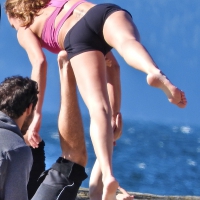 Acrobatic girl practicing in spandex shorts Acrobatic girl in shorts