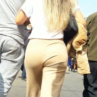 Blonde in yellow pants