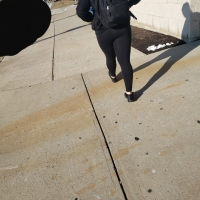 Thick college babe walking in leggings Thick college babe in leggings