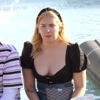 Candid busty pale girl showing some cleavage while sitting Club-NotMe-TCZ-2022-Cleavage and pale skin.mp4-2023-06-11-07h35m03s427.jpg