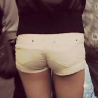 Skinny blonde in yellow shorts